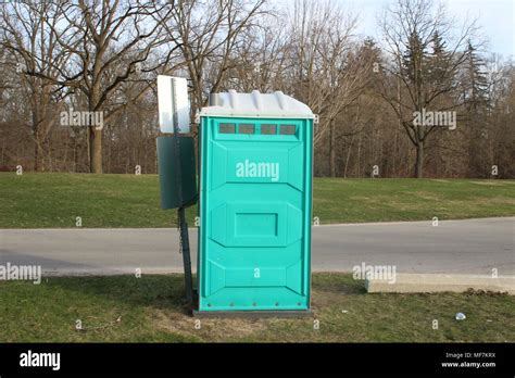 A Dirty Blue Portable Toilet In A Park Nasty Looking Place To Go To