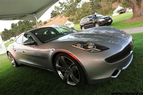 The attached pics show her with her summer clothes on. Electric Sports Car Fisker - Sports Cars