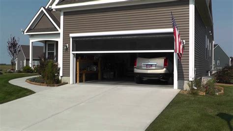 If you have old doors and remain unused, why don't you create a unique privacy screen from those doors? Motorized Garage Screen - YouTube
