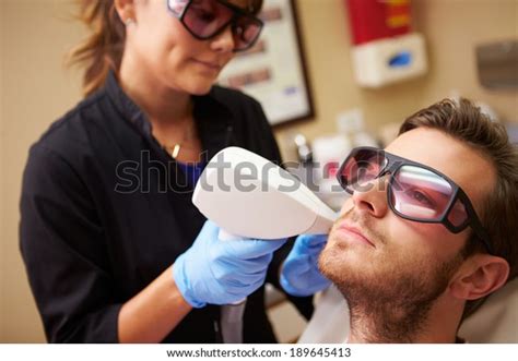 Man Having Laser Treatment Beauty Clinic Stock Photo 189645413
