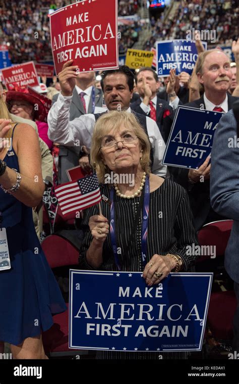 gop delegates cheer and wave signs during the republican national convention july 20 2016 in