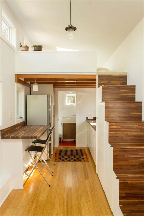 This home is 12x24 feet long with a 12/12 roof and loft. The Hikari Box Tiny House Plans - PADtinyhouses.com