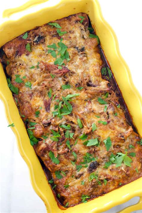 This bold casserole comes together quickly so you can enjoy it any night of the week. Smoked Pulled Pork Enchiladas and Smoker Recipes for Cinco ...