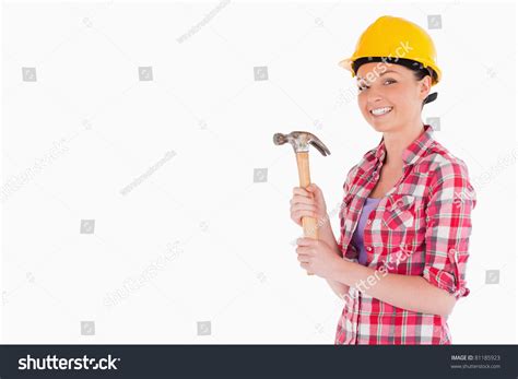 Attractive Woman Holding Hammer While Standing Stock Photo 81185923