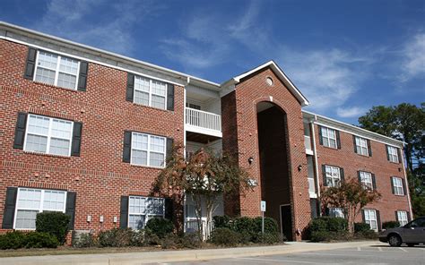 This beautiful cottage features 3 bedrooms, 2 baths, a living room, a cozy den, and a well appointed kitchen that even includes a wine fridge! Crescent Commons - Fayetteville, NC | Apartment Finder