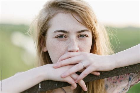 portrait of a beautiful thoughtful girl with freckles close up by stocksy contributor andrei