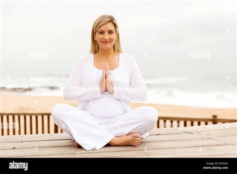 Pretty Pregnant Woman Meditating Outdoors Stock Photo Alamy