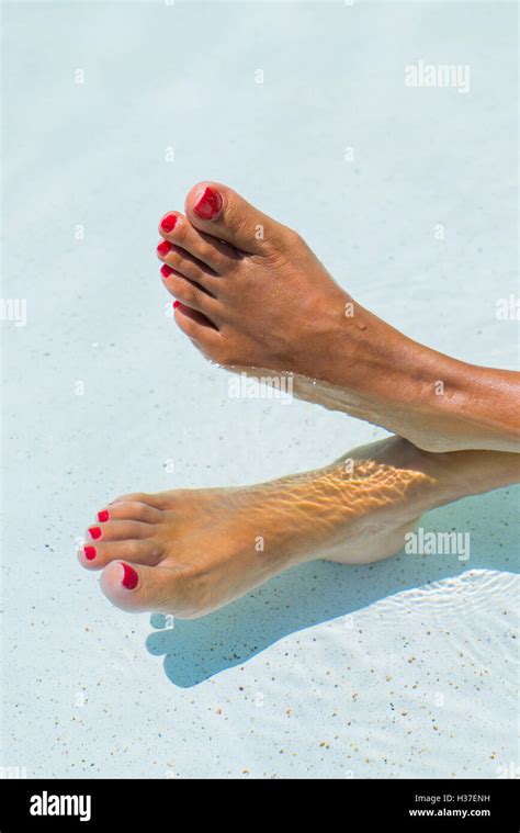 Woman S Feet At The Swimming Pool Stock Photo Alamy