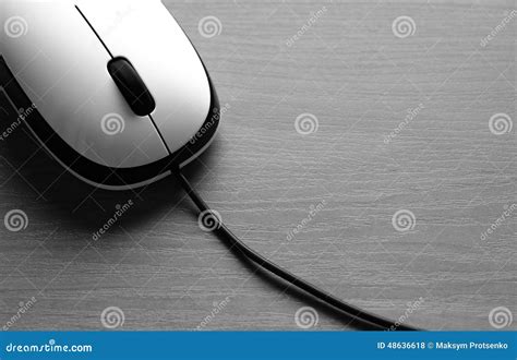 White Wired Computer Mouse On A Wooden Table Stock Photo Image Of