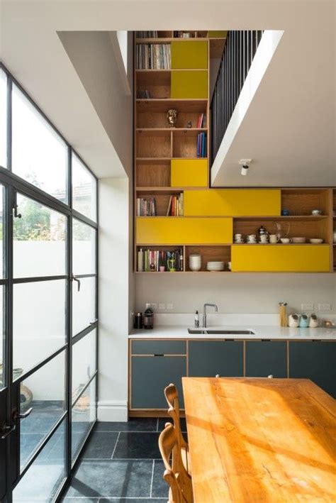 Builders surplus carries an unbeatable selection of in stock unfinished wood kitchen cabinets. Double Height shelves for multiple use in a double height space by MW Architects | Kitchens ...