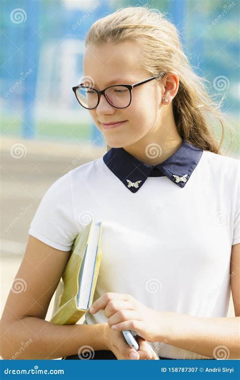 Portrait Of A Schoolgirl With Glasses Outdoors Stock Image Image Of