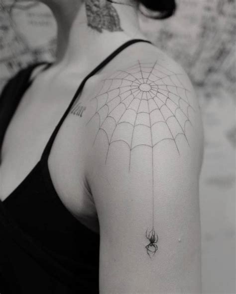 Spiderweb Tattoo Located On Demi Lovatos Shoulder