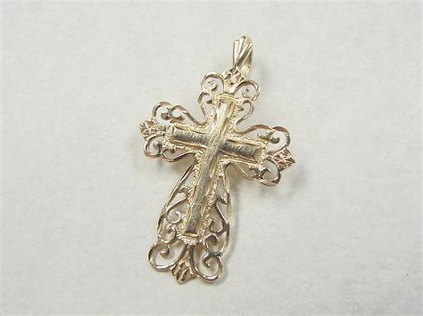 vintage 14k gold ornate cross pendant from arnoldjewelers on ruby lane