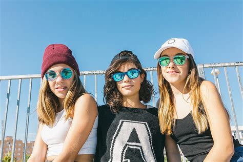 Three Girlfriends In Sunglasses By Stocksy Contributor Victor Torres Stocksy