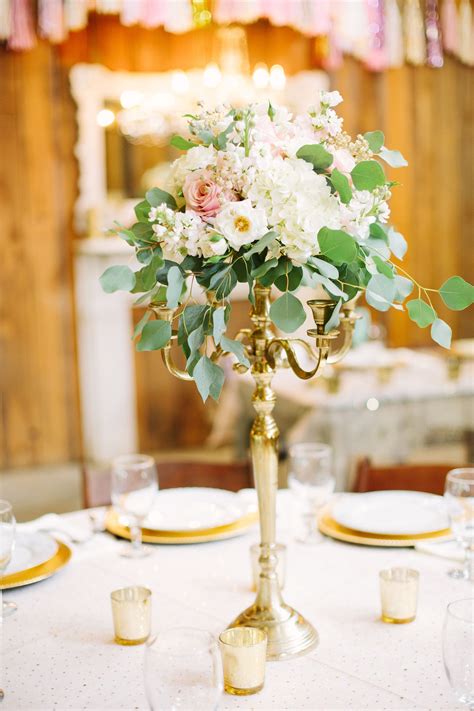 Gold Candelabra Centerpiece With Blush And Ivory Flowers Pretty Wedding