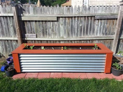 Our diy planter box ideas are quite versatile and customizable which means you'll be able to successfully grow beautiful herbs, flowers, and even the lipscomb is a metal planter box with a simple and versatile design. wood planter box with decorative metal siding | Crowley ...