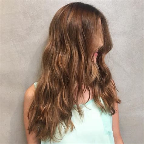 long wavy v cut layers on warm light brown hair the latest hairstyles for men and women 2020