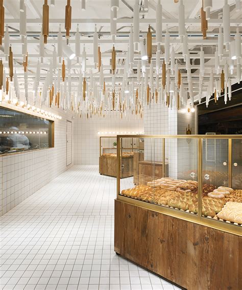 rolling pins hang from ceiling inside beijing bakery by B ...