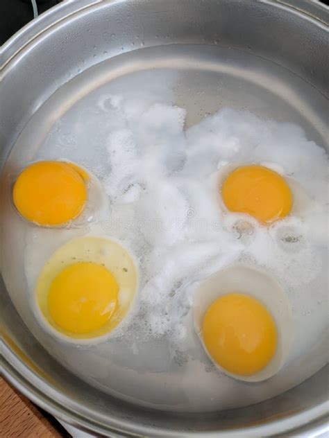 Poaching Fresh Eggs In A Pan Of Water Stock Image Image Of Healthy