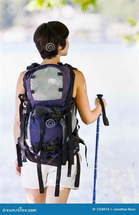 Woman Hiking With Backpack And Walking Stick Stock Photo Image Of