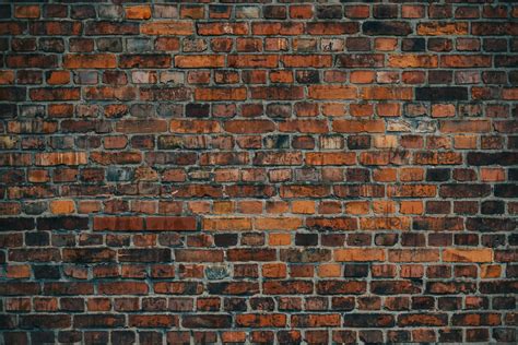 Brown And Black Brick Wall Photo Free Image On Unsplash