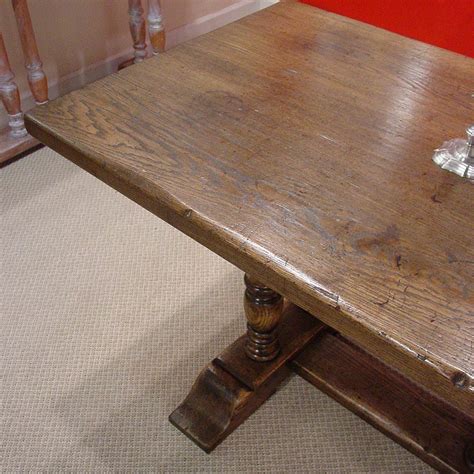 Antiqued Oak Finish Turned Leg Table