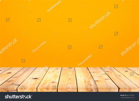 Wood Table Top On Orange Wall Background Stock Photo 361731002