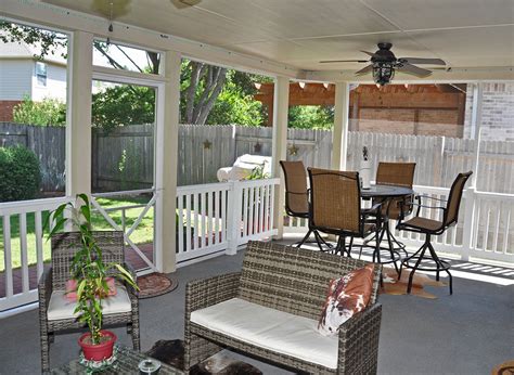 A vinyl deck railing doesn't need much maintenance. Vinyl railing flawlessly completes this screened-in porch ...