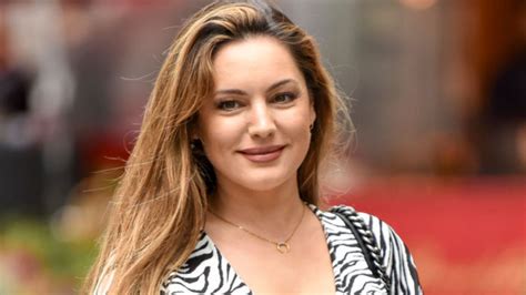 Kelly Brook Wows Fans In A Plunging Zebra Print Dress And Its Just £