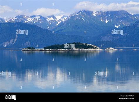 Beautiful Alaskan Landscape With Mountains And Still Waters Stock Photo