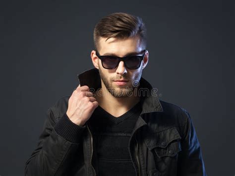 Portrait Of Cool Looking Handsome Young Man In Casual Wear Stock Photo