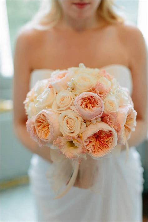 A combination of flowers large (peonies and ranunculus), medium (sweet peas), and petite (jasmine and 'hally jolivette' cherry blossoms) gives this bouquet dimension. Choosing your Wedding Flowers - French Wedding Style