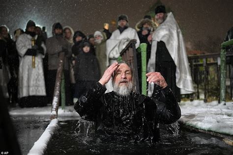 Brave Orthodox Christians Plunge Into Icy Water For Epiphany Celebrations Across Europe Despite