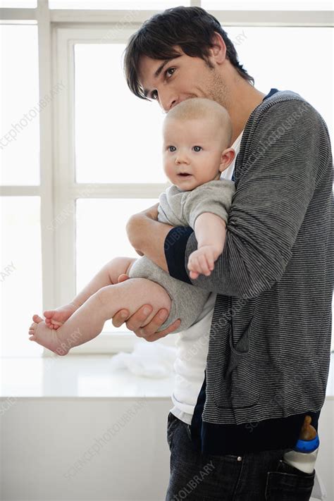 Father Holding Baby Boy Stock Image F Science Photo Library