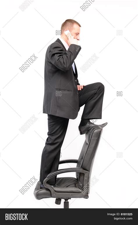 Man Standing On Chair Image And Photo Free Trial Bigstock