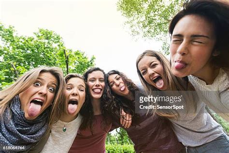 teasing tongue photos and premium high res pictures getty images