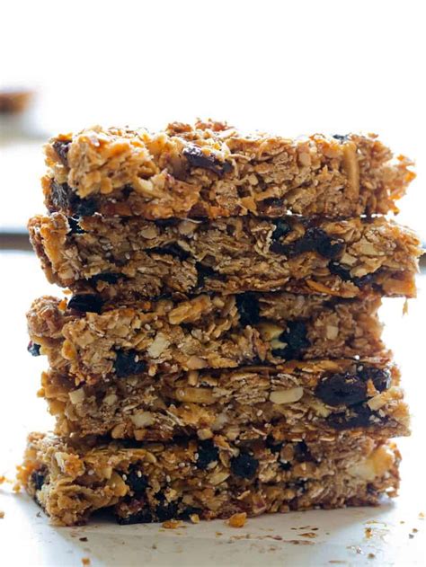 Throw the rolled oats, raisins and flaked almonds into a large mixing bowl and combine. Homemade Granola Bars | Snack recipe | Spoon Fork Bacon