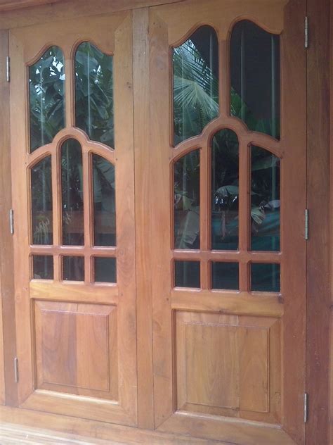 Bavas Wood Works Kerala Style Wooden Window Door Designs