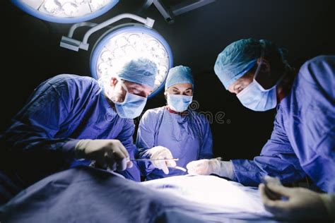 Medical Team Performing Operation In Hospital Stock Photo Image Of