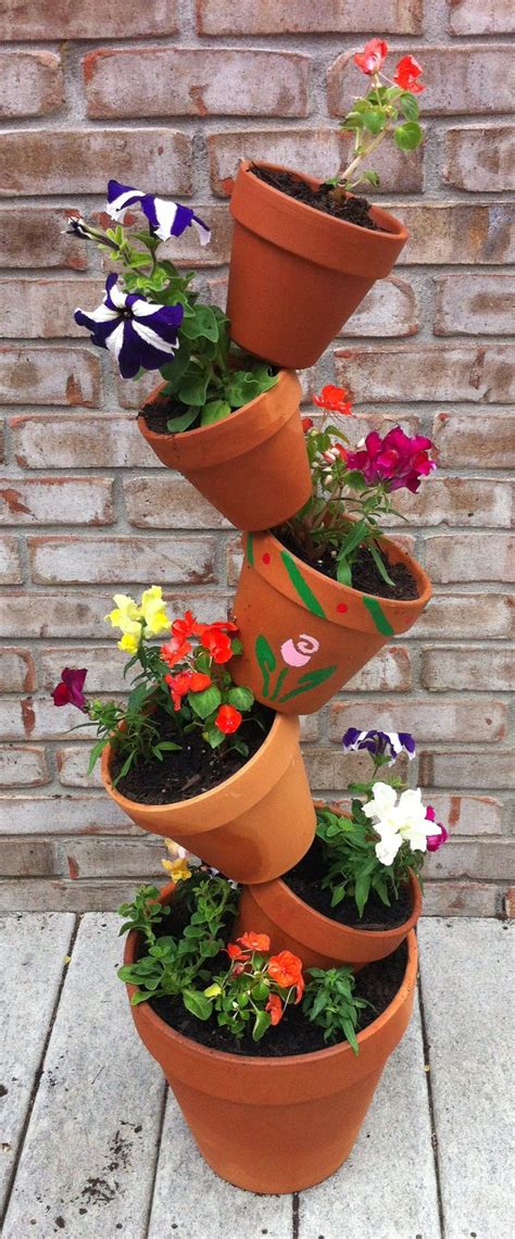 Pin By Emily Alayne Davis On For The Home Flower Tower Flower Pot