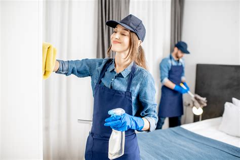 Professional Cleaners During The Work Indoors A Mothers Touch Movers