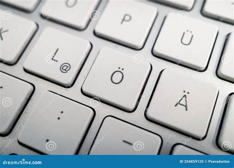 Close Up At German Alphabet Keypad On Metal Keyboard Stock Photo