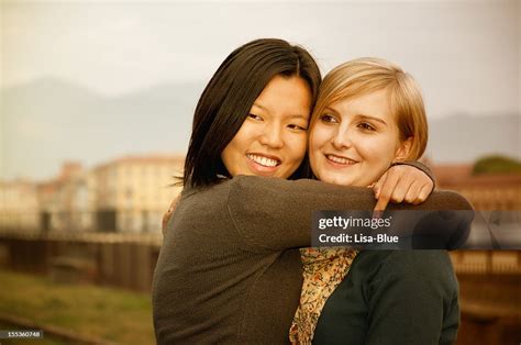 Mixed Race Lesbian Couple Embracing Bildbanksbilder Getty Images