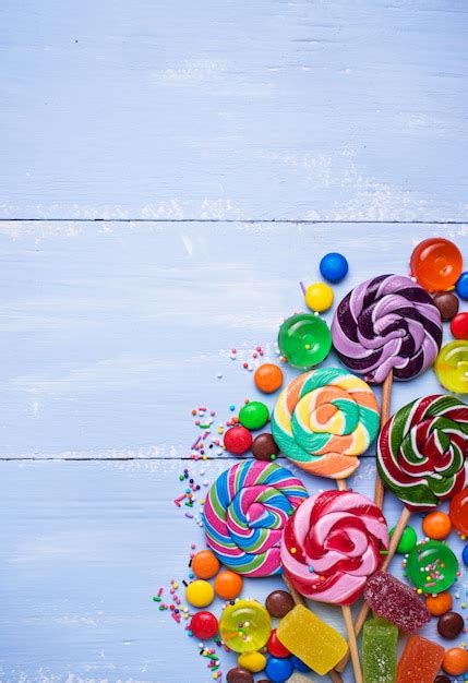 Premium Photo Assortment Of Colorful Candies And Lollipops