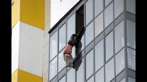 Guy Falls Off Eight Story Building Youtube