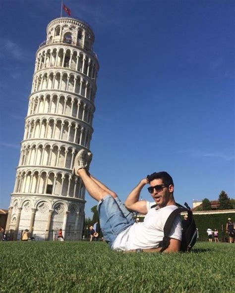 15 Brilliantly Original Photos Of People Posing With The Leaning Tower