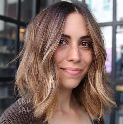 Longer oval faces may have a more prominent forehead which, as explained above, can be disguised under a full or side feathery fringe. 50 Best Haircuts for Long Faces in 2021 - Hair Adviser