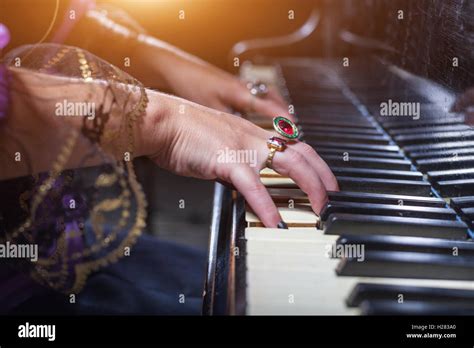 Woman Playing The Piano Stock Photo Alamy