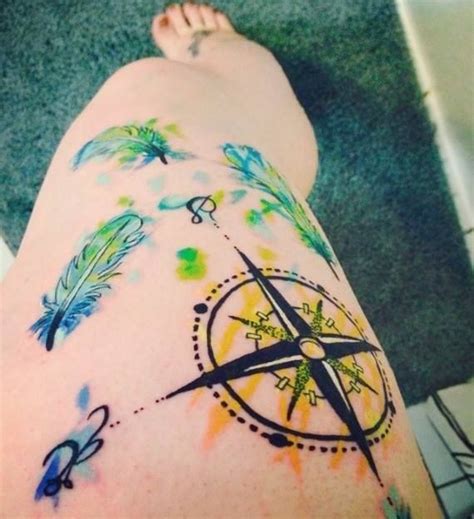 Watercolor Feather And Compass Tattoo On Leg