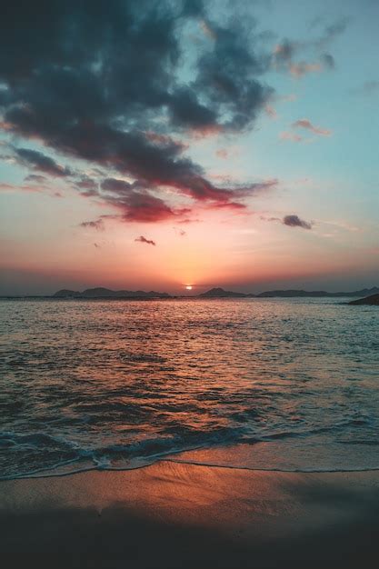 Premium Photo Colorfull Red And Blue Sunset On The Beach